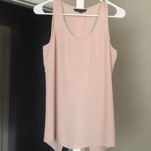 Pale pink dress tank with an open slit in the back